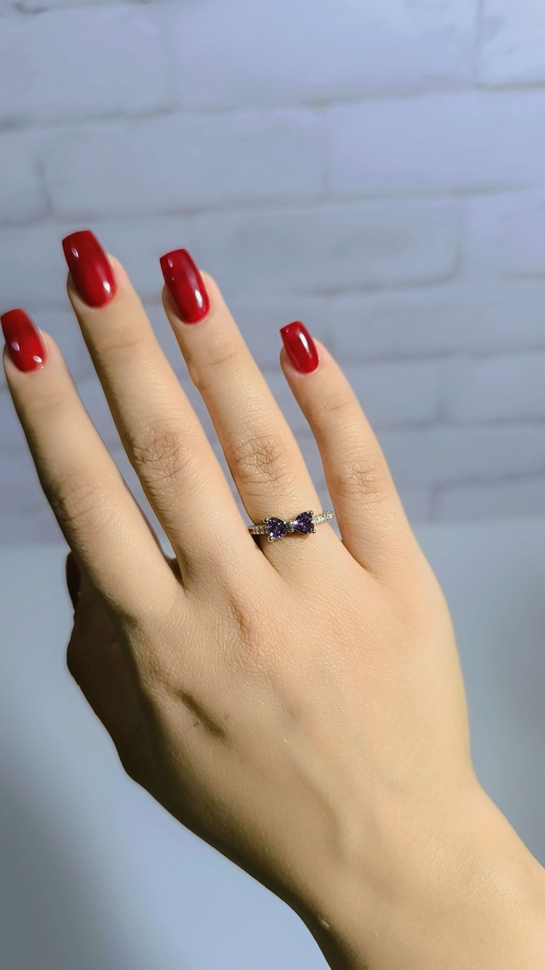 انگشتر پاپیون نگین بنفش